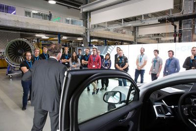 Students from various Swiss universities participating in the presentations of the divisions and a tour through the innovation and production center.
