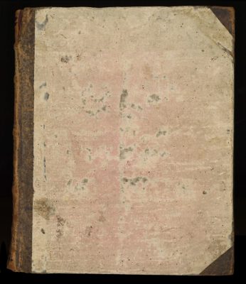 The book binding, which well-worn suggests that the book has been well read.