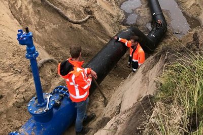 Relocation of an AC pipe (500 mm) with an HDPE pipe.