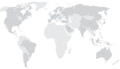 Grey map showing GF locations around with the world with blue dots
