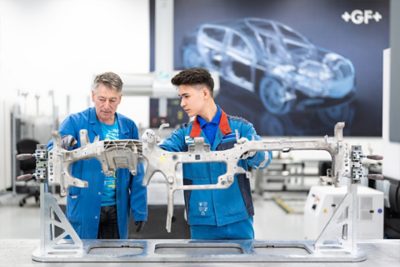 Two generations of employees working together