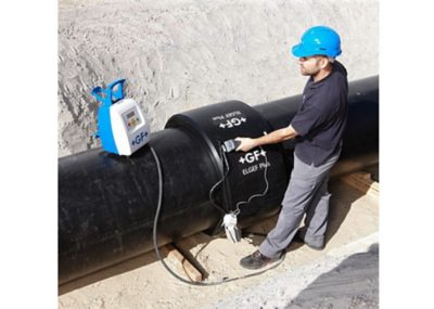 Construction worker with helmet on-site with Electrofusion and ELGEF pipe