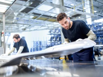 Two men working in a factory