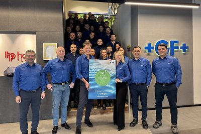 Proud to achieve carbon-neutrality in the Cerkezkoy (Turkey) a.k.a Georg Fischer Hakan Plastik factory site of GF Building Flow Solutions (first row, from left to right): Harun Albayrak, Production Manager, Andreas Weiglein, Vice President Operations, Thomas Fuhr, Chief Technology Officer, Esra Erdal, Managing Director, Yenal Gündüz, Supply Chain & Operations Director, Barış Uğurlu  Head of Quality Management & OPEX. Source: GF Building Flow Solutions  