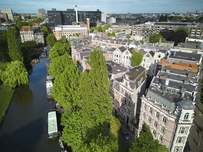 Plantage Muidergracht is both a canal and a street in Amsterdam’s historic Plantage district. Photo credits: Paul Lagro