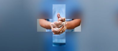 Male healthcare worker washing hands