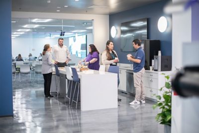 Employees enjoying a well-deserved break in our refreshed and welcoming breakroom—designed for comfort and connection.
