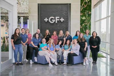 Proud faces, strong team spirit—celebrating our newly renovated GF Signet Irwindale office together.