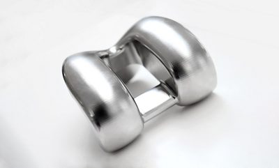 The complex forms of a knee implant require exceptionally smooth surfaces, making it one of the most difficult implants to manufacture.