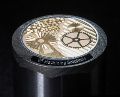 Centerpiece features a brass dial