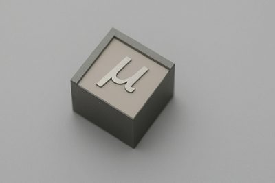 Micromachining part with sharp edges and vertical walls.