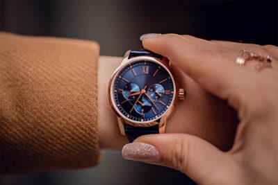 Stylish watch on woman hand