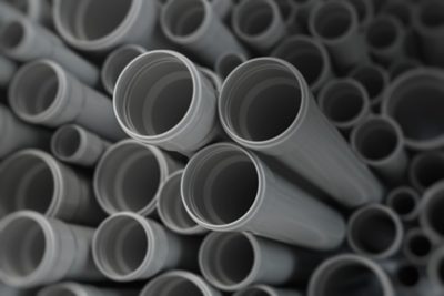 PVC plastic pipes and tubes background. 3d illustration